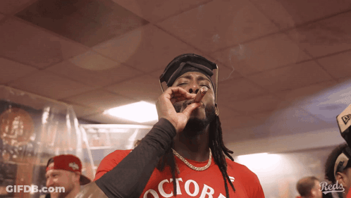 Man In Red Shirt Smoking Cigar GIF