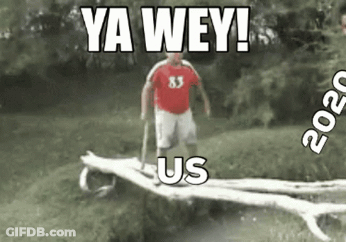 Man In Red Shirt Standing On Log Saying Ya Wey Us GIF
