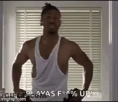 Man In Red Shirt Standing With Hands Up GIF