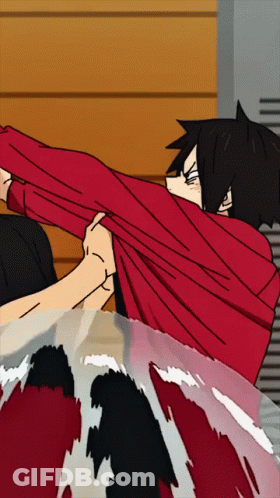Man In Red Shirt Stretching Arms On Couch GIF