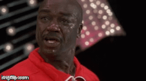 Man In Red Shirt Sweating GIF