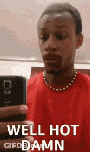 Man In Red Shirt Taking Selfie GIF