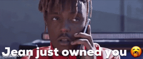 Man In Red Shirt Talking On Phone GIF
