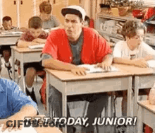 Man In Red Shirt Talking To Another Man GIF