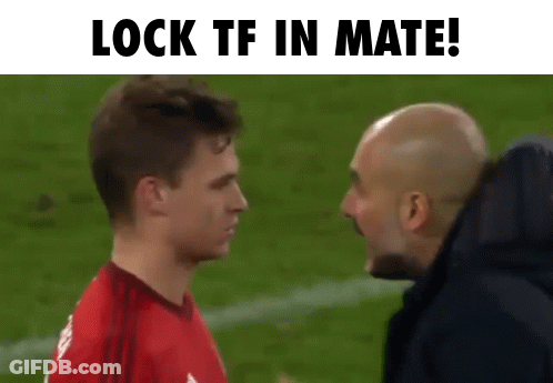Man In Red Shirt Talking To Another Man On Soccer Field GIF