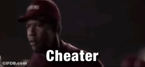 Man In Red Shirt Talking To Man In Red Hat Saying Cheater GIF