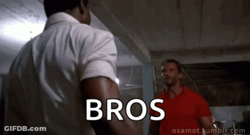 Man In Red Shirt Talking To White Shirt GIF