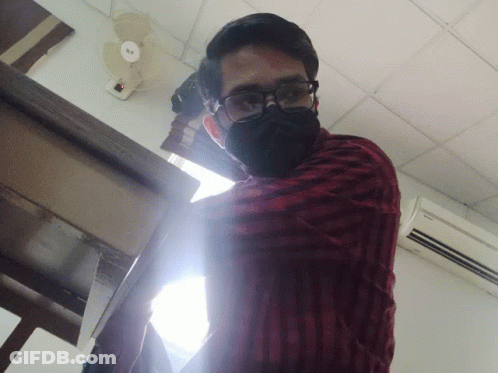 Man In Red Shirt Upside Down GIF