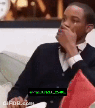 Man In Red Shirt Wearing Headphones Making Face GIF