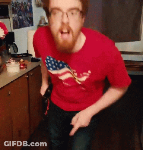 Man In Red Shirt With American Flag GIF
