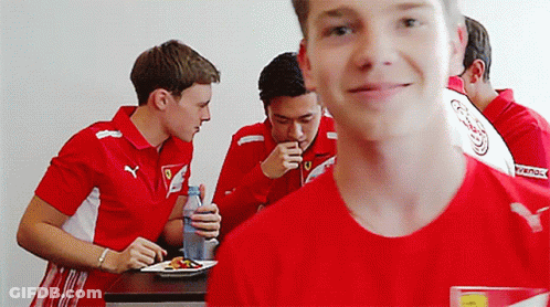 Man In Red Shirt With Ferrari Logo GIF