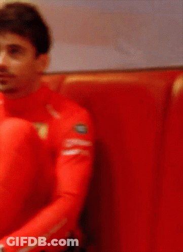 Man In Red Shirt With Ferrari Logo GIF