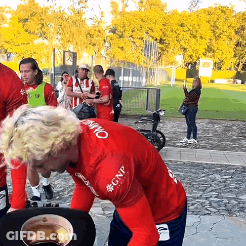 Man In Red Shirt With GNP GIF