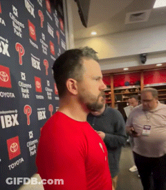 Man In Red Shirt With Ibx Wall GIF