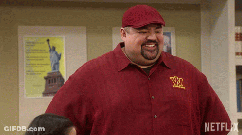 Man In Red Shirt With Letter W GIF