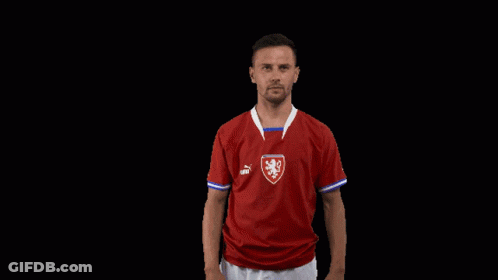 Man In Red Shirt With Lion Waving Hands GIF