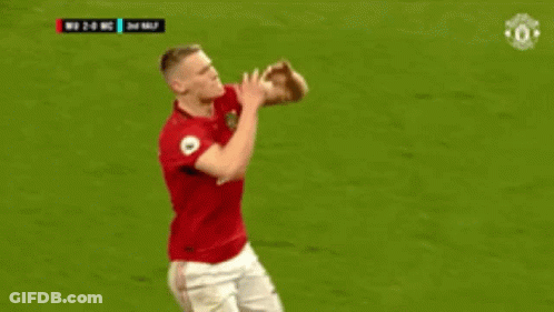Man In Red Shirt With Number 39 Kneeling GIF