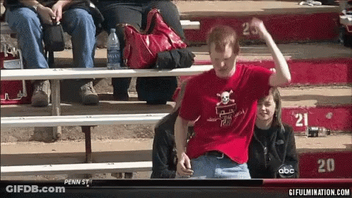 Man In Red Shirt With Skull And Crossbones GIF