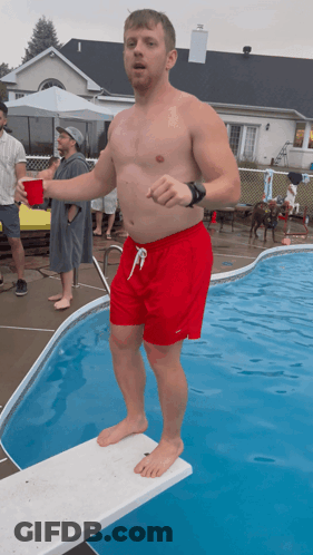 Man In Red Shorts On Diving Board GIF