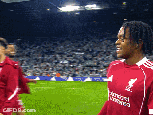 Man In Red Standard Chartered Shirt GIF