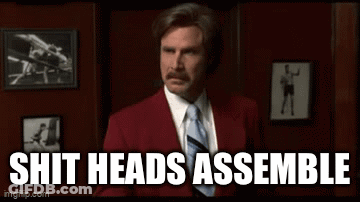 Man In Red Suit And Tie By Picture Wall GIF