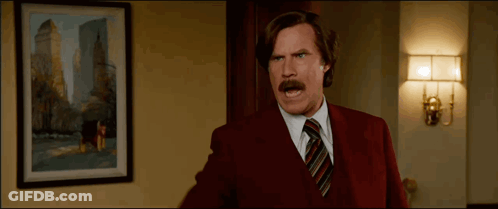 Man In Red Suit And Tie GIF