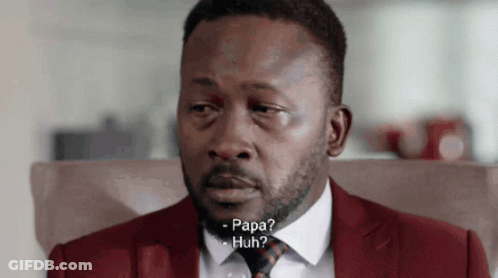 Man In Red Suit And Tie Talking GIF