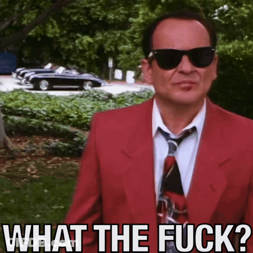 Man In Red Suit Asking What GIF