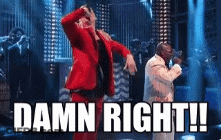 Man In Red Suit Dancing With Man In White Suit GIF