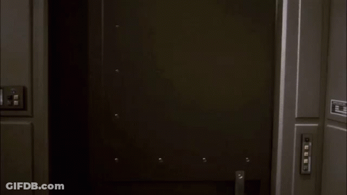 Man In Red Suit Hugging Woman GIF