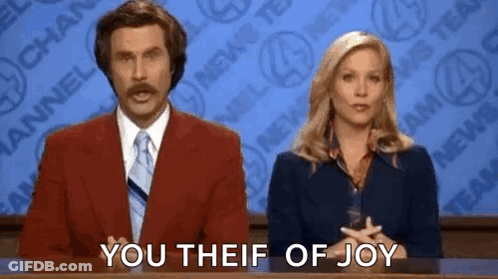 Man In Red Suit Next To Woman In Blue Dress GIF