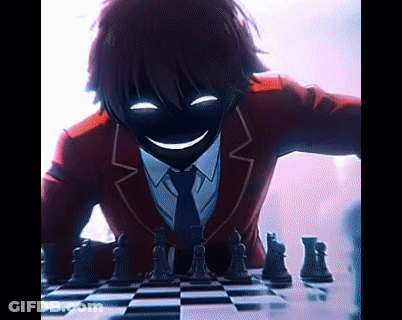 Man In Red Suit Playing Chess Smiling GIF