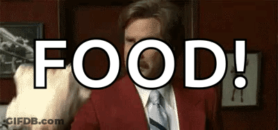 Man In Red Suit Pointing Gun At Food GIF