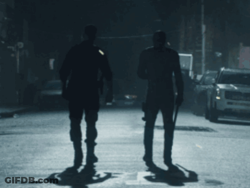 Man In Red Suit Standing Next To Another Man GIF