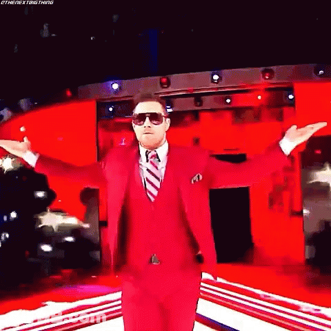 Man In Red Suit With Arms Outstretched GIF
