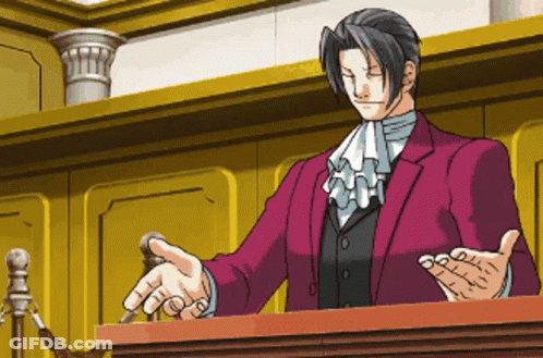 Man In Red Suit With Eyes Closed At Podium GIF
