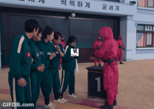 Man In Red Suit With Green Uniforms GIF