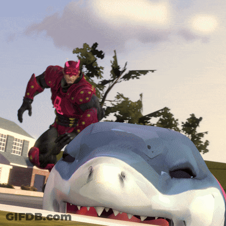 Man In Red Suit With R Standing Next To Shark GIF