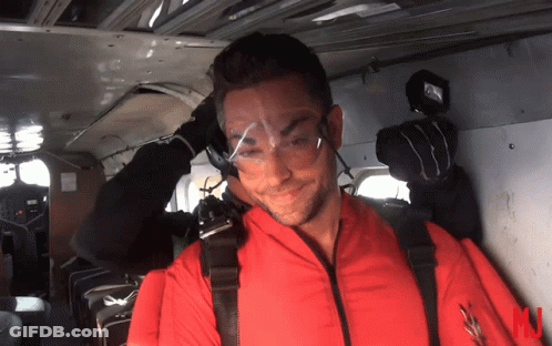 Man In Red Suit With Safety Goggles GIF