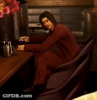 Man In Red Suit With Yo On Chair GIF