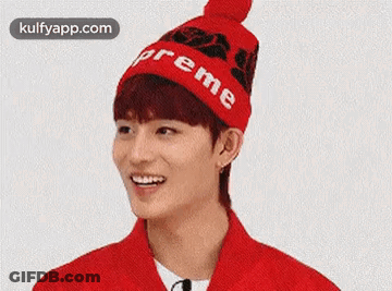 Man In Red Supreme Hat Smiling GIF