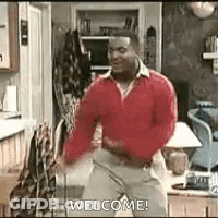Man In Red Sweater Dancing Saying Welcome GIF