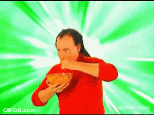 Man In Red Sweater Eating Chips GIF