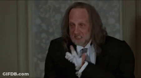 Man In Red Sweater Making Funny Face GIF