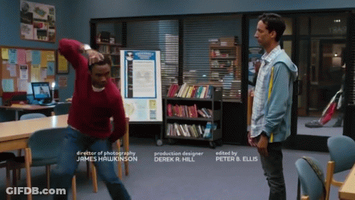 Man In Red Sweater Next To Man In Blue Shirt GIF