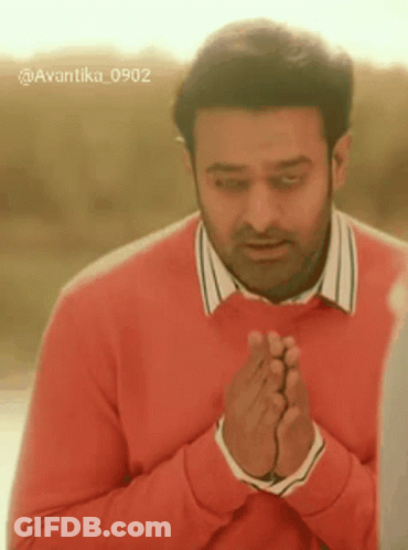 Man In Red Sweater Praying GIF