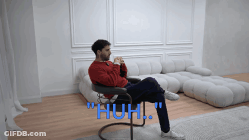 Man In Red Sweater Saying Huh GIF