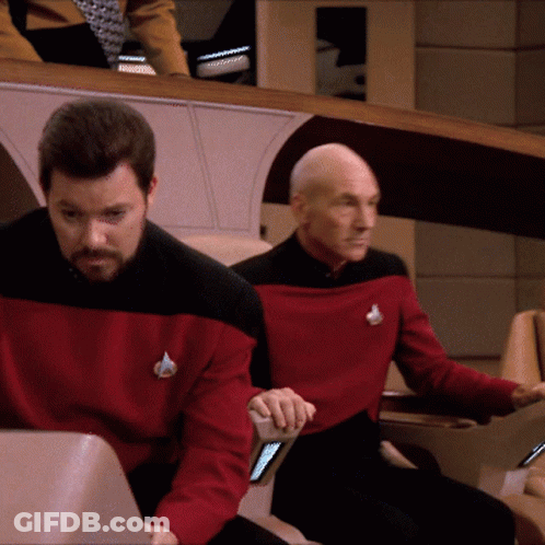 Man In Red Sweater With Star Trek Logo GIF