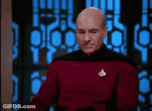 Man In Red Sweater With Star Trek Logo GIF