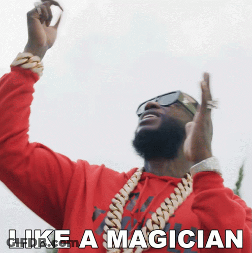 Man In Red Sweatshirt Like A Magician GIF